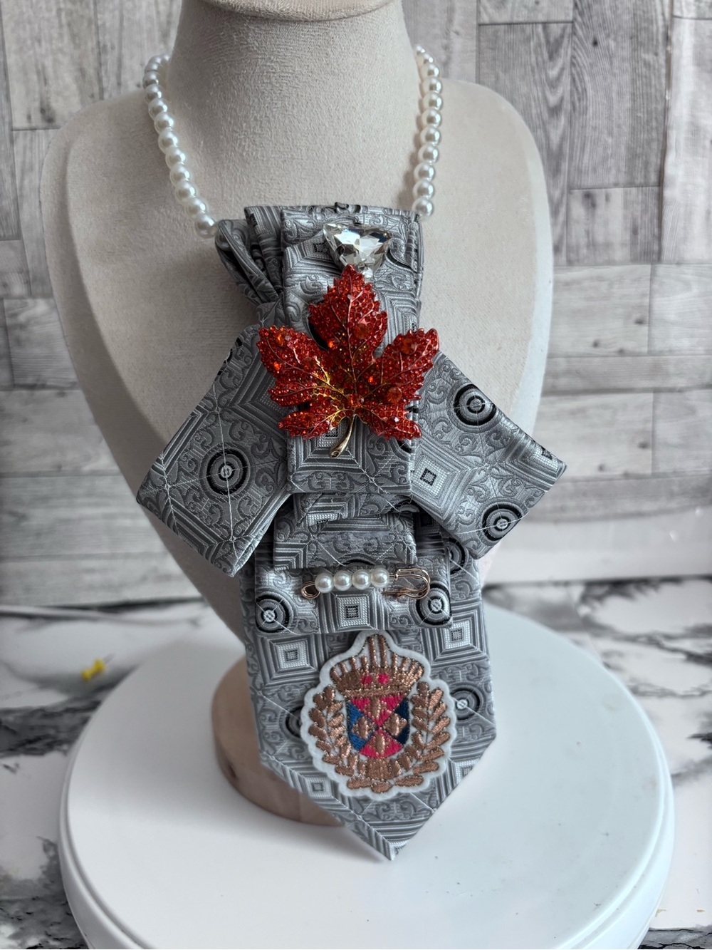 Gray Geometric Neck Tie with Red Leaf Brooch and Pearl Accents
